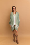 Elegant and lightweight sage floral kimono wrap for any occasion.