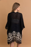 Floral embroidery black kimono for layering and style.