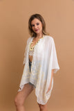 Sophisticated embroidered white kimono with detailed floral pattern.